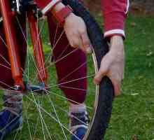 Hoe om die wiel van `n fiets reguit te maak