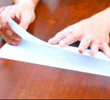 Hoe om `n papiervliegtuig te maak wat truuks doen