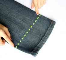 Hoe om `n trui op jeans te maak