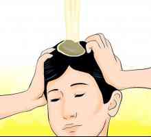 Hoe om haarverlies te vermy deur te masseer met eierolie