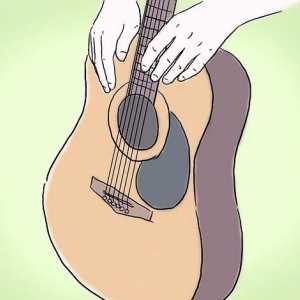Hoe om die akoestiese kitaar te speel